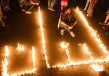 إضاءة كلمة لبنان بالشموع في ساحة ايليا – صيدا