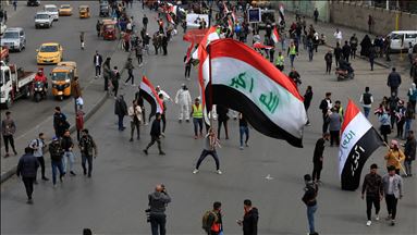 إصابة 9 محتجين عراقيين في تجدد الاشتباكات مع قوات الأمن وسط بغداد