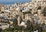 اخلاء مبنى مهدد بالانهيار في شارع الجهاد بمنطقة التبانة – طرابلس