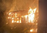 إهماد حريق داخل غرفة خشبية في غادير