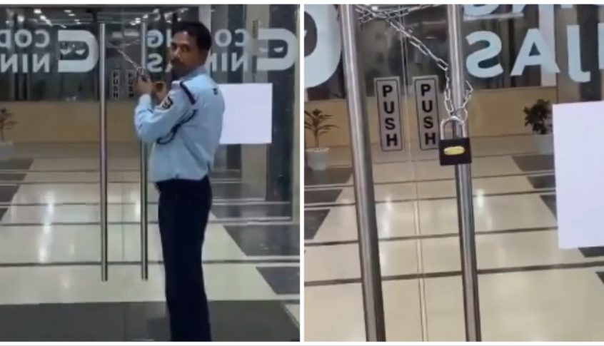 بالفيديو: مدير يغلق باب شركته بالسلاسل لمنع موظفيه من المغادرة!