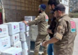 فريق المستجيب الاول يشارك في عملية توزيع مساعدات قطرية في فنيدق